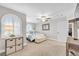 Comfortable bedroom with a ceiling fan, storage boxes, and cozy bed at 9435 Westwind Rd, Las Vegas, NV 89139