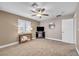 Bright bedroom with carpet, neutral walls, and ceiling fan at 9435 Westwind Rd, Las Vegas, NV 89139