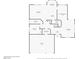 Black and white floor plan of the first floor layout which includes the garage, living spaces, and one bedroom at 9435 Westwind Rd, Las Vegas, NV 89139