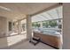 The covered patio features a relaxing hot tub at 9435 Westwind Rd, Las Vegas, NV 89139