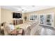 Comfortable living room with plush furniture and a view of the pool at 9435 Westwind Rd, Las Vegas, NV 89139