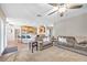 Spacious living room featuring an open-concept layout with seamless transition to kitchen at 9435 Westwind Rd, Las Vegas, NV 89139