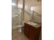 Bright bathroom with a glass-enclosed shower, granite vanity, and neutral decor at , Las Vegas, NV 89178