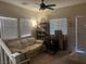 Cozy living room featuring a comfortable couch, built-in bookshelves, and plenty of natural light at , Las Vegas, NV 89178