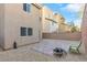 Spacious backyard with low maintenance gravel, paver patio and stylish fire pit at 10415 Scarpa St, Las Vegas, NV 89178