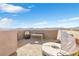 Relaxing rooftop terrace with outdoor seating, grill, and mountain views at 10415 Scarpa St, Las Vegas, NV 89178