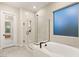 Modern bathroom showcasing a luxurious soaking tub and walk-in glass shower at 12160 Harris Summit Ave, Las Vegas, NV 89138