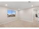 Bedroom featuring neutral carpeting and exterior view window at 12160 Harris Summit Ave, Las Vegas, NV 89138