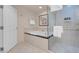 This bathroom features a soaking tub and separate glass shower with white tiles at 125 E Harmon Ave # 809, Las Vegas, NV 89109