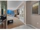 Bedroom featuring a city view, kitchenette, and comfortable sitting area at 125 E Harmon Ave # 809, Las Vegas, NV 89109