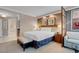 Luxury bedroom features plush bed, sitting area, and bathroom at 125 E Harmon Ave # 809, Las Vegas, NV 89109