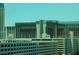 Horseshoe building with modern architectural details and clear sky in Las Vegas at 125 E Harmon Ave # 809, Las Vegas, NV 89109