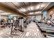 Well-equipped fitness center with treadmills, weight machines, mirrors, and patterned flooring at 125 E Harmon Ave # 809, Las Vegas, NV 89109
