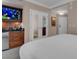 A kitchenette is situated adjacent to a bedroom area, complete with modern appliances at 125 E Harmon Ave # 809, Las Vegas, NV 89109