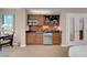 Cozy kitchenette with sink, microwave, and dining table is conveniently attached to a main bedroom at 125 E Harmon Ave # 809, Las Vegas, NV 89109