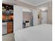 A view showcasing the kitchenette and its adjacent closet storage space in the suite at 125 E Harmon Ave # 809, Las Vegas, NV 89109