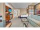Comfortable living area featuring a kitchenette, seating area, and a view into the bedroom at 125 E Harmon Ave # 809, Las Vegas, NV 89109