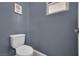 Powder bathroom with a modern toilet and a small window for natural light at 12816 Alcores St, Las Vegas, NV 89141