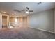 Cozy loft area with plush carpeting, recessed lighting, and staircase access at 12816 Alcores St, Las Vegas, NV 89141