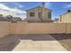 Fenced-in backyard with a concrete area for outdoor living at 1331 Ebbetts Pass, Las Vegas, NV 89110