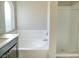 Bathroom has a soaking tub, a separate glass enclosed shower, and granite vanity at 1331 Ebbetts Pass, Las Vegas, NV 89110