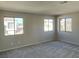 Spacious bedroom with multiple windows offering natural light and scenic neighborhood views at 1331 Ebbetts Pass, Las Vegas, NV 89110