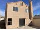 View of the home's exterior from the backyard with mountain views at 1331 Ebbetts Pass, Las Vegas, NV 89110