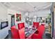 The dining room features a table, chairs, and lighting fixtures, adjacent to other living spaces at 1805 Ivanhoe Way, Las Vegas, NV 89102