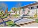 Landscaped front yard with stone pathways, cacti and desert plants leading to the home's entrance at 1805 Ivanhoe Way, Las Vegas, NV 89102