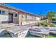 Landscaped front yard with stone pathways and desert plants leading to the entrance of the home at 1805 Ivanhoe Way, Las Vegas, NV 89102