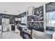 Modern kitchen featuring stainless steel appliances and geometrically patterned accent wall at 1805 Ivanhoe Way, Las Vegas, NV 89102