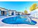 Beautiful in-ground pool featuring a fountain, surrounded by a spacious patio and landscaping at 1805 Ivanhoe Way, Las Vegas, NV 89102