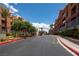 Neighborhood street showing the tree lined entrance to this beautiful complex at 19 E Agate Ave # 307, Las Vegas, NV 89123