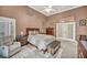 Comfortable bedroom with a ceiling fan and neutral-colored walls at 2107 Eaglepath Cir, Henderson, NV 89074