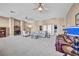 Oversized living room with varied seating options, neutral palette, and good light at 2107 Eaglepath Cir, Henderson, NV 89074