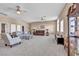 Expansive living room featuring ample seating, neutral tones, and an open layout at 2107 Eaglepath Cir, Henderson, NV 89074