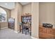 Functional office nook with desk, bookshelf, and natural light at 2107 Eaglepath Cir, Henderson, NV 89074