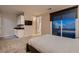 Bedroom features a private ensuite, bar and large window at 221 Errogie St, Henderson, NV 89012