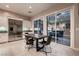 Modern kitchen with stainless steel appliances and sliding glass doors leading to an outdoor space at 221 Errogie St, Henderson, NV 89012