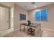 Home office space with natural lighting and a neutral palette at 221 Errogie St, Henderson, NV 89012