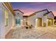 Charming courtyard entrance to the home showcasing desert landscaping and stone walkway at 2239 Discovery Lake Ct, Henderson, NV 89044