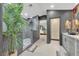 Modern bathroom featuring dual vanities, decorative mirrors, and modern finishes at 2728 Monrovia Dr, Las Vegas, NV 89117