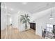 Inviting hallway with hardwood floors, iron railing, and a clear view of the well-lit and spacious interior at 2728 Monrovia Dr, Las Vegas, NV 89117