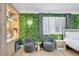 Main bedroom featuring a plant wall, wood accents, and neutral colors at 2728 Monrovia Dr, Las Vegas, NV 89117