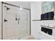 Shower features white tiled walls, a glass door, and a built-in niche at 2728 Monrovia Dr, Las Vegas, NV 89117