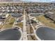 An aerial view of a community park featuring a playground, picnic area and walking paths at 2740 Aldine Ct, Las Vegas, NV 89142