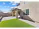 Enclosed patio space with a small turf area, perfect for outdoor relaxation at 2740 Aldine Ct, Las Vegas, NV 89142