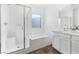 Bright bathroom featuring a shower-tub combo, modern vanity, and stylish design at 2740 Aldine Ct, Las Vegas, NV 89142