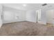 Spacious bedroom with natural light, plush carpets, and access to an ensuite bathroom at 2740 Aldine Ct, Las Vegas, NV 89142