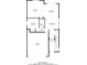 A floor plan of the first floor of a home featuring a kitchen, living room and garage at 2740 Aldine Ct, Las Vegas, NV 89142